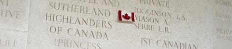 Canadian flag with names and text on the wall