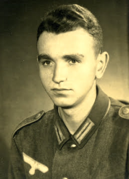Young man in military uniform, vintage sepia photograph